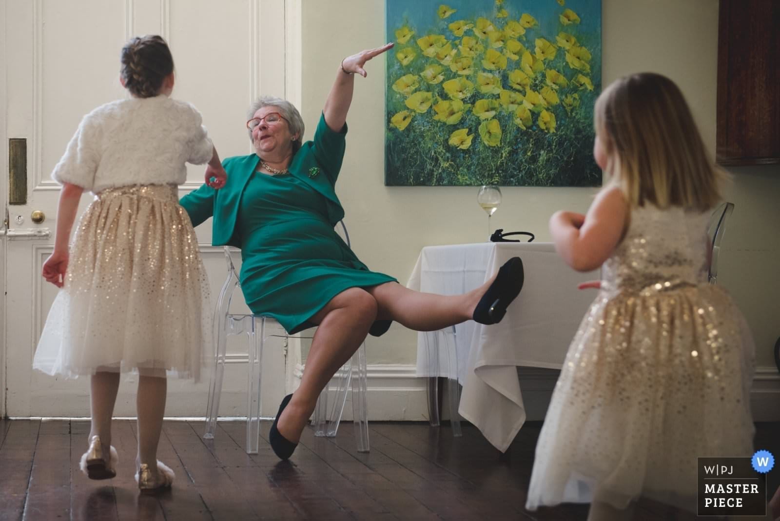 Mother of Bride larking about at Lichfield wedding